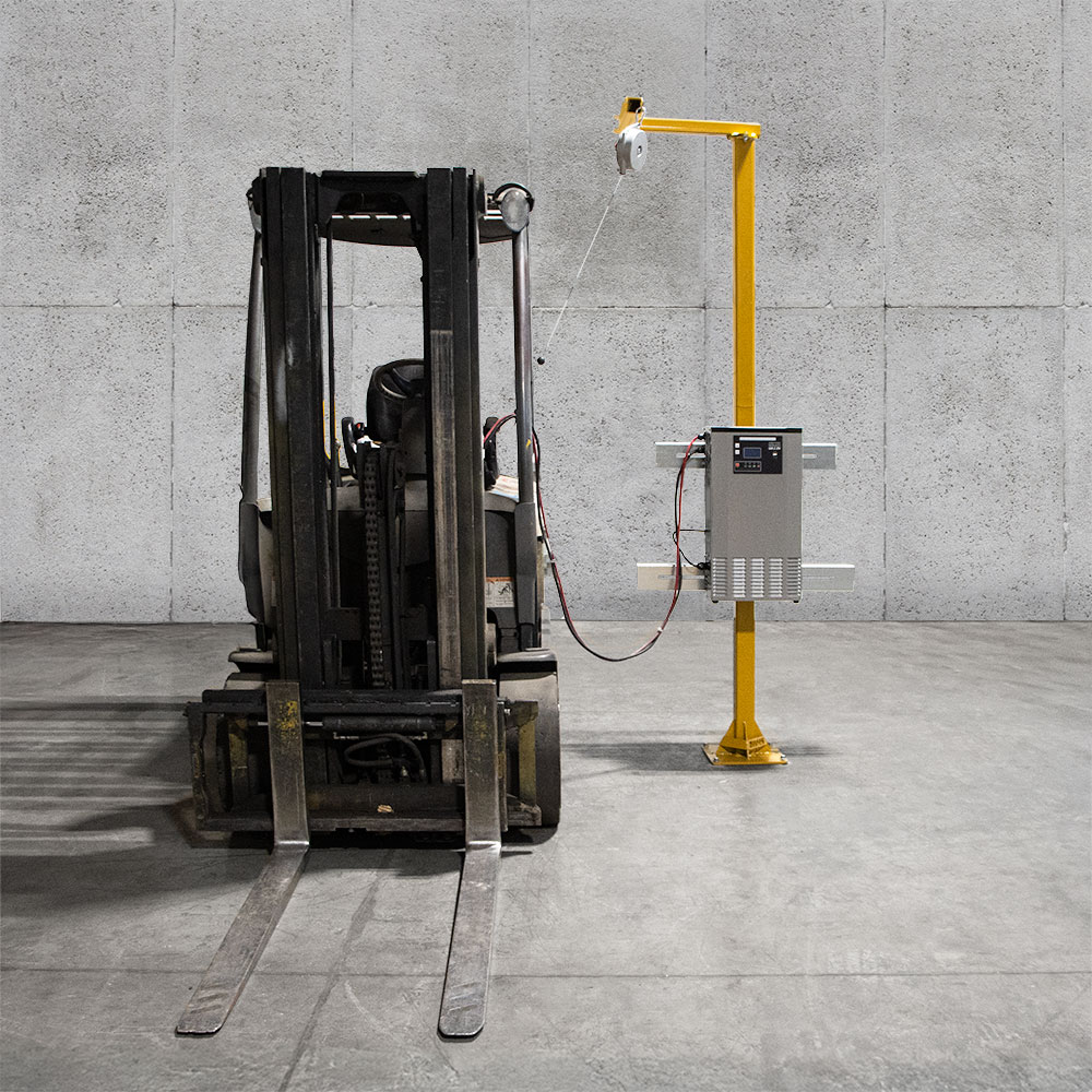 Forklift charging at a Universal Forklift Charger Stand
